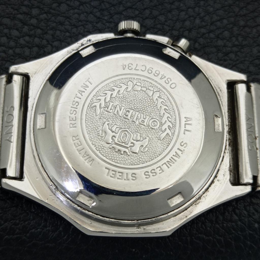 ORIENT CRYSTAL AUTOMATIC 46961 JAPAN MENS VINTAGE WHITE DIAL WATCH a704843-1