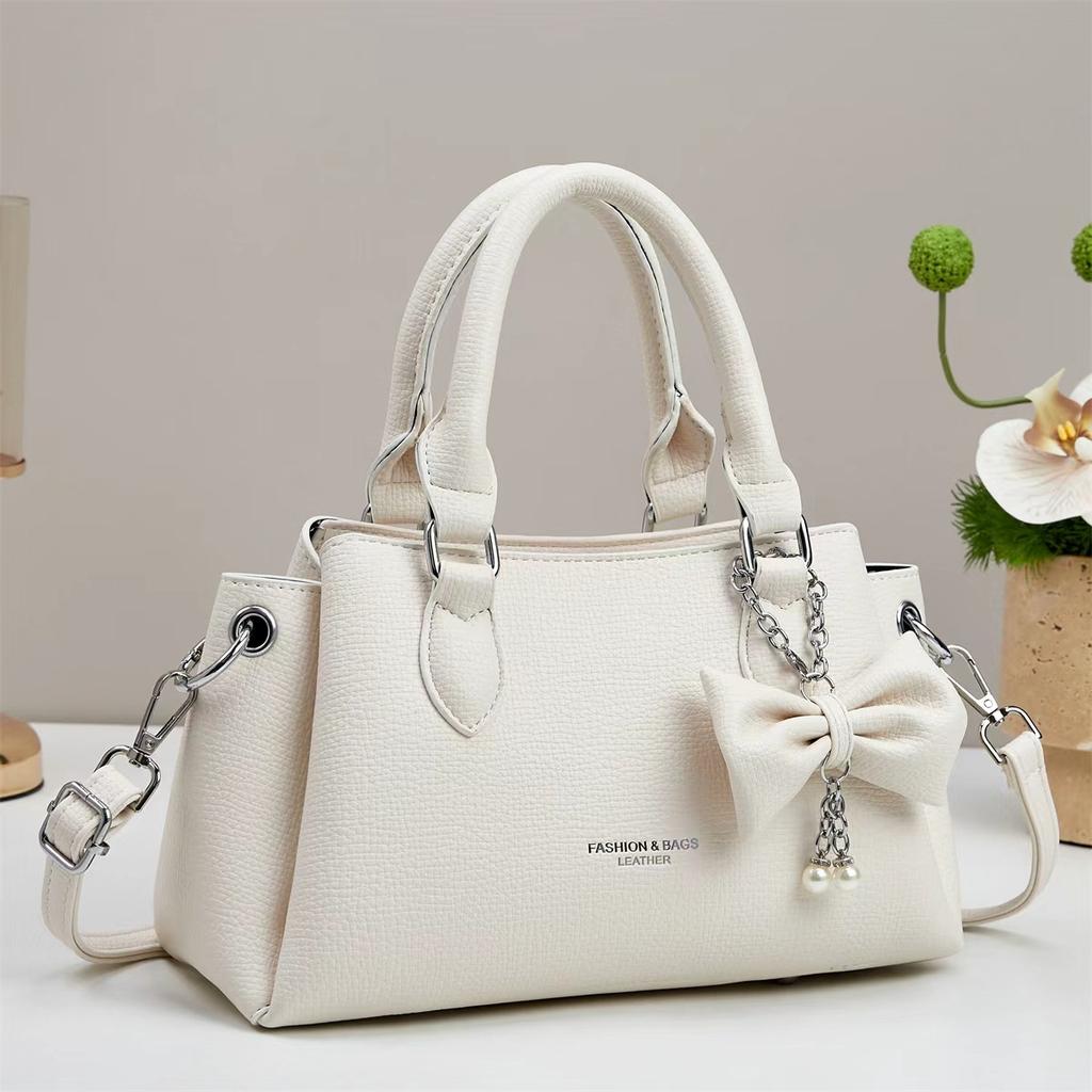 Sensitive lychee pattern Korean fashion shoulder bag large capacity multi-layer butterfly pendant commuter versatile messenger bag