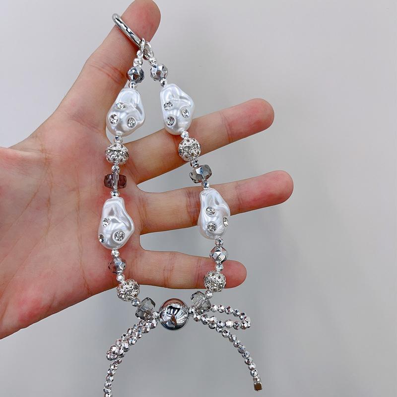 

Y2K Роскошный Lrregular Ремешок для запястья с жемчужными бусинами, бриллиантовый ремешок для телефона с подвеской в виде банта, защитный ремешок для телефона от падения