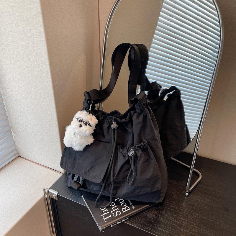Cloth bag women's large-capacity new summer leisure niche drawstring single shoulder crossbody commuter tote bag