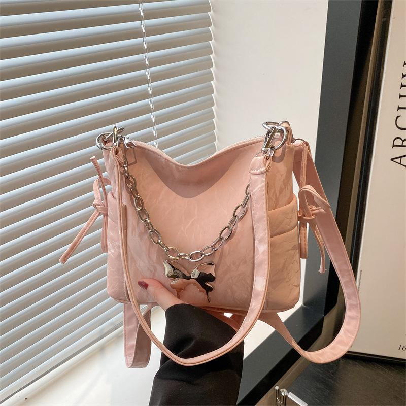 Korean version of fashion butterfly chain messenger bag women's 2025 summer new versatile hand carry shoulder armpit bag tide