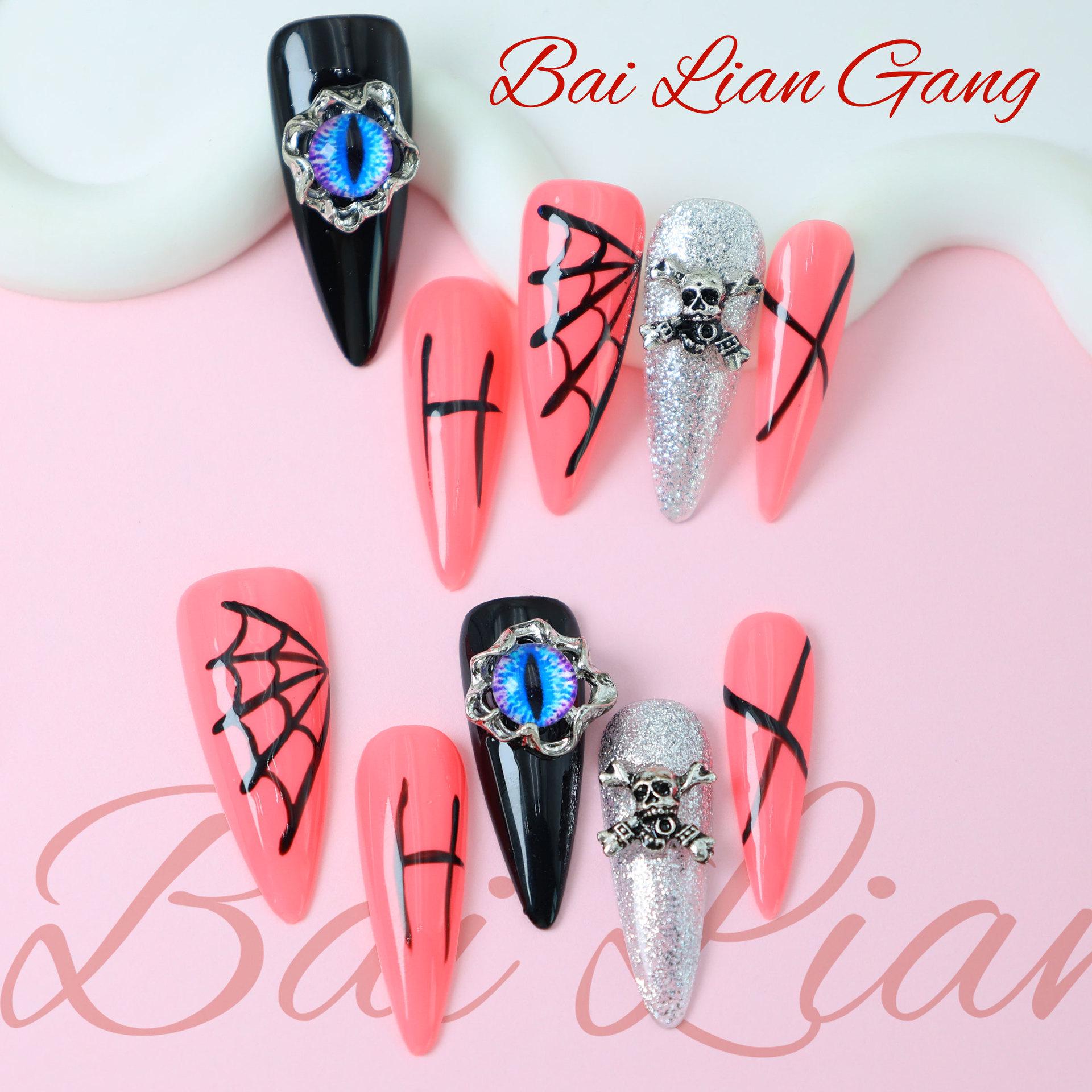 

Refined Steel Cat Eye Skull Long Pointed Armor Nails Large