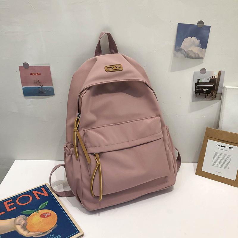 Schoolbag1010 spring new Korean style nylon solid color backpack fashion casual student couple backpack