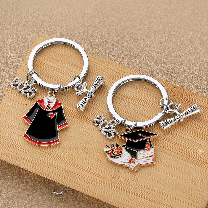 2/10 Pièces Porte-clés Cérémonie de Remise de Diplômes Mignon Créatif Chapeau de Diplômé Livre Robe Pendentif Porte-clés Cadeau Commémoratif Cérémonie de Remise de Diplômes