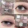 DIKALU 9-Color Earth Tone Eyeshadow Palette - Shimmer & Matte, Transparent Douyin Style.
