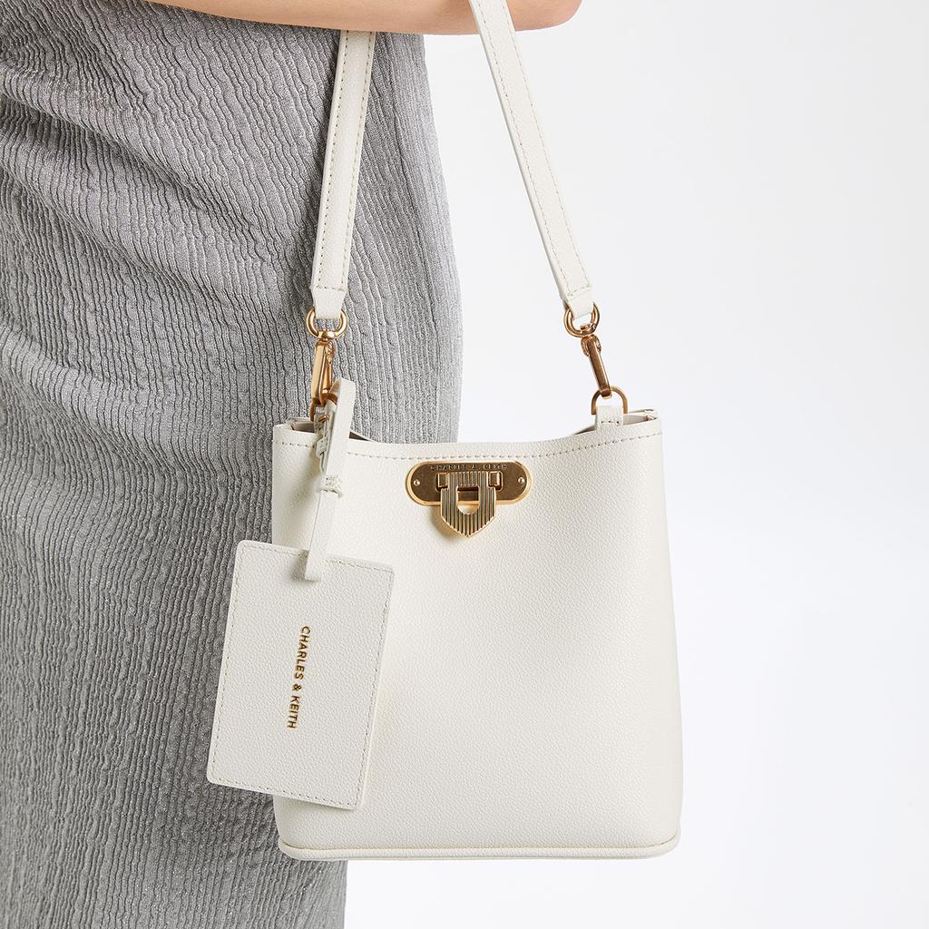 Charles & Keith Metal Buckle Versatile Pu Leather Shoulder Bag Underarm Bucket Bag Crossbody Bag Small Size Women bags Beige Black Multi CK2-10782094