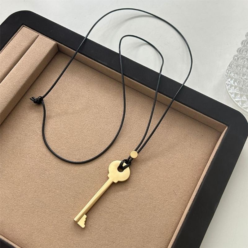 Elegant Metal Key Charm Black Rope Necklace Stylish Layering Pieces For Everyday Wear