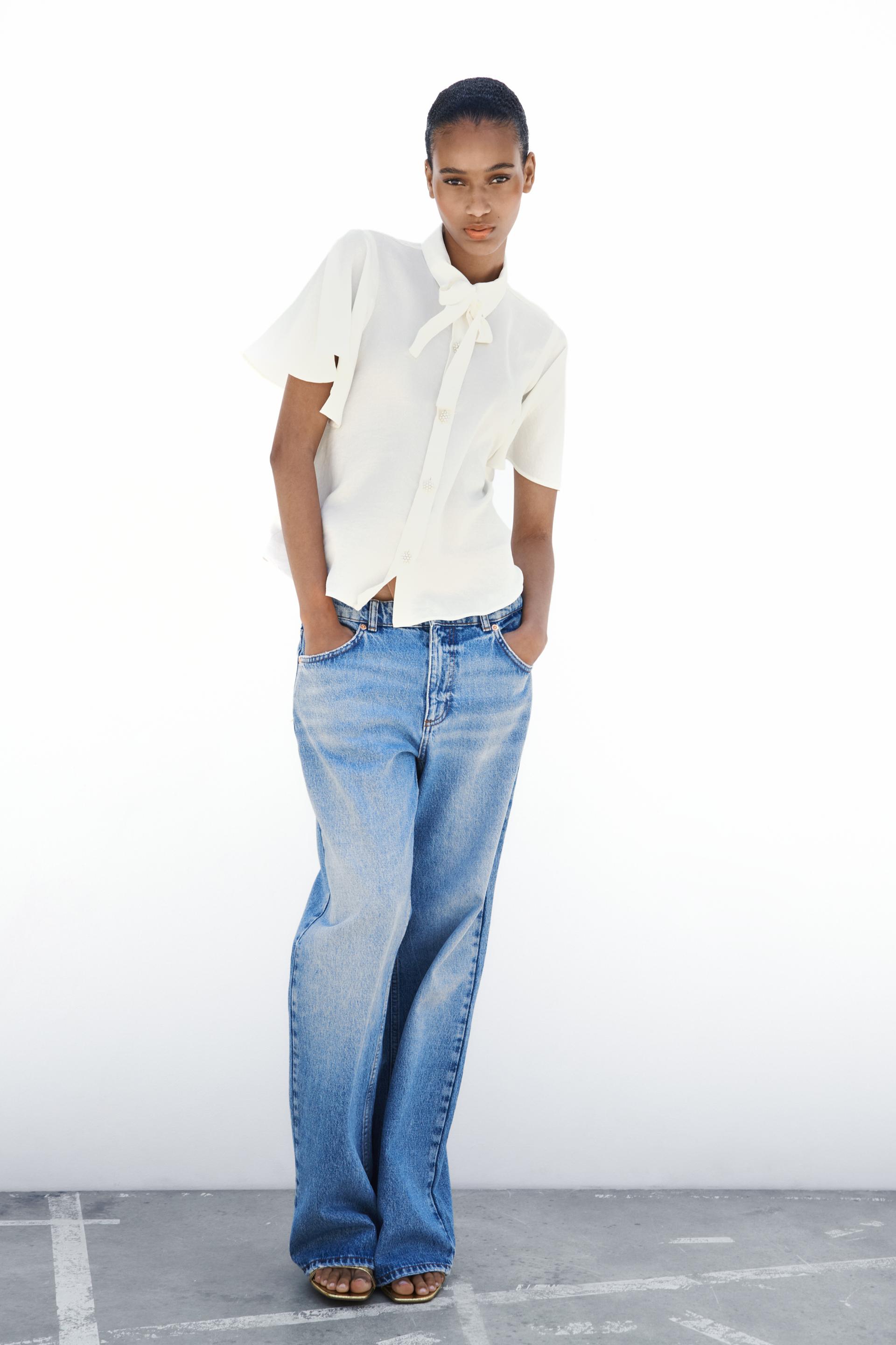 

РУБАШКА С БАНТОМ И ПУГОВИНАМИ С ИСКУССТВЕННЫМ ЖЕМЧУГОМ