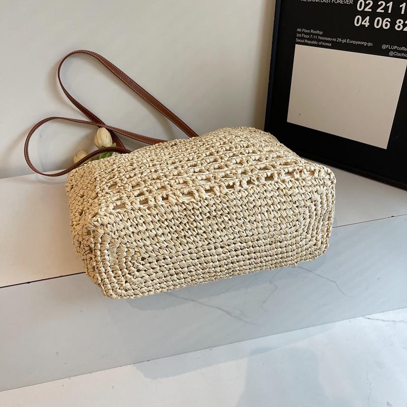 Handwoven Straw Tote Bag with Leather Handles and Open Weave Design Perfect for Summer Beach and Casual Outings
