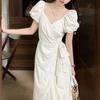 French irregular ruffle leaf edge strap bubble sleeve dress women's summer new temperament thin medium and long skirt