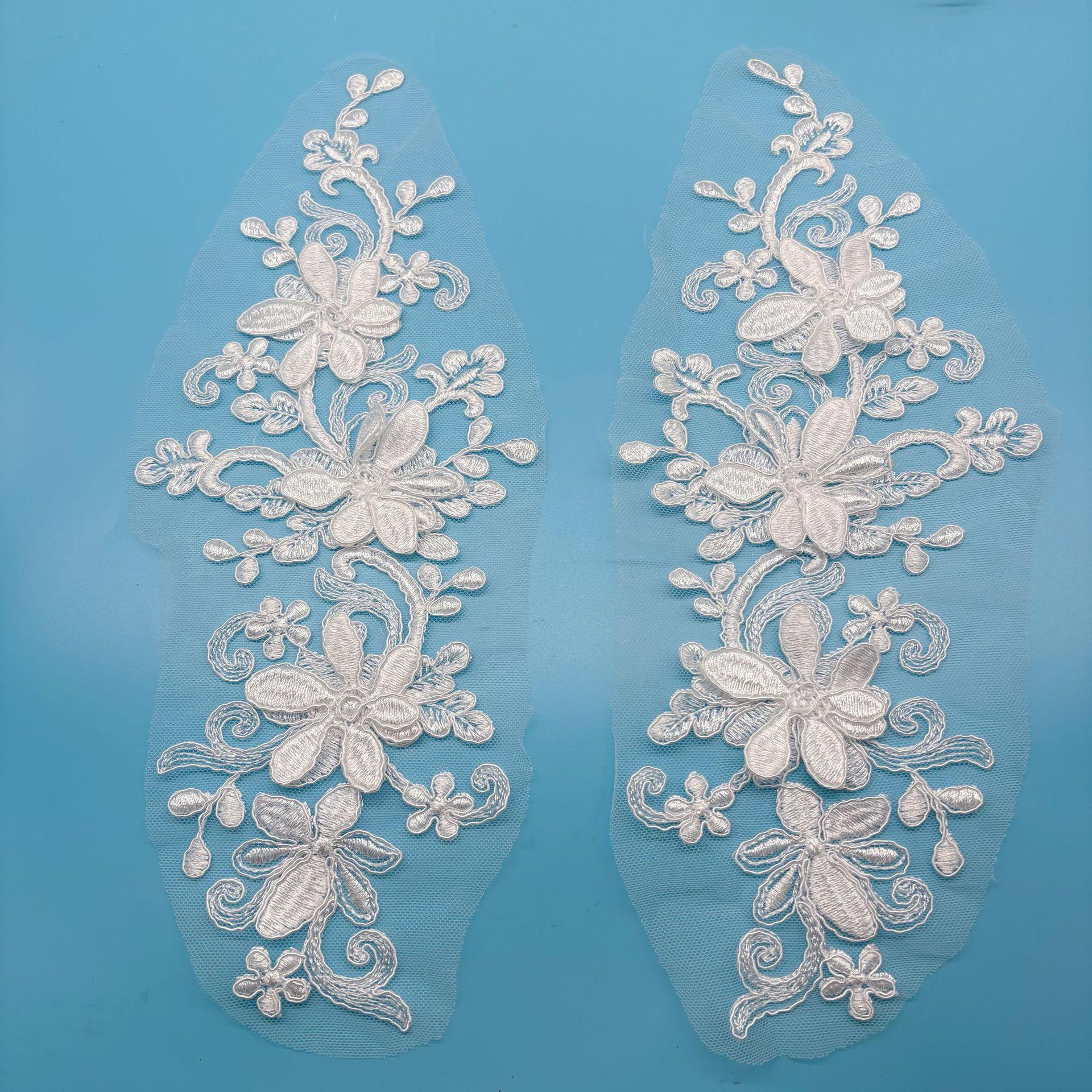 

Ручная работа Белое вышитое кружево Косточки для каркаса Трехмерное кружево Платье для выступлений Свадебный подол Тканевая наклейка Одежда Пара Цветочные аксессуары White pair flower