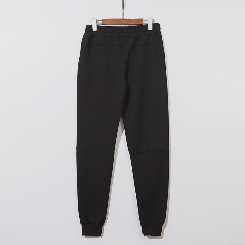 Funktionelle, einfarbige Unisex-Sport-Jogginghose mit Reißverschlusstaschen