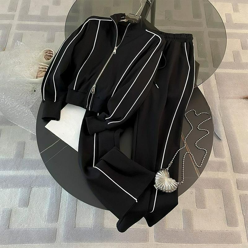 

Женский осенний модный спортивно-повседневный костюм-двойка в западном стиле. Тренд на брюки высокой посадки и широкие штанины XS