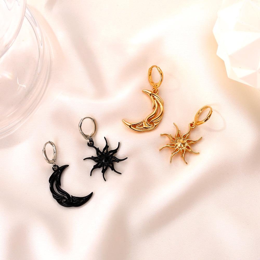 

Sun and Moon Asymmetrical Abstract Earrings with Star and Moon Design