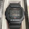 Used CASIO G-SHOCK DW-5600 Series Black Digital Watch, In Good Condition, with Box, Manual, and Bag