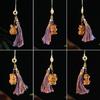 Sandalwood Zodiac Animal Keychain with Colorful Tassel