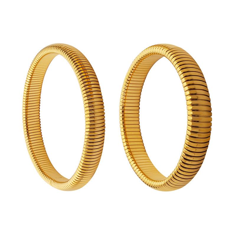Retro Elastic Wide & Narrow Band Bracelet for Women - Gold-Plated Titanium Steel Fashion Bangle with French Personality Niche Design.