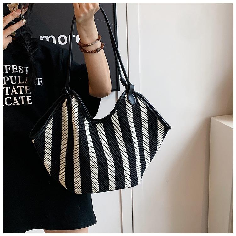 New largecapacity shoulder bag bag niche design knitted tote bag commuter versatile striped woven tote bag