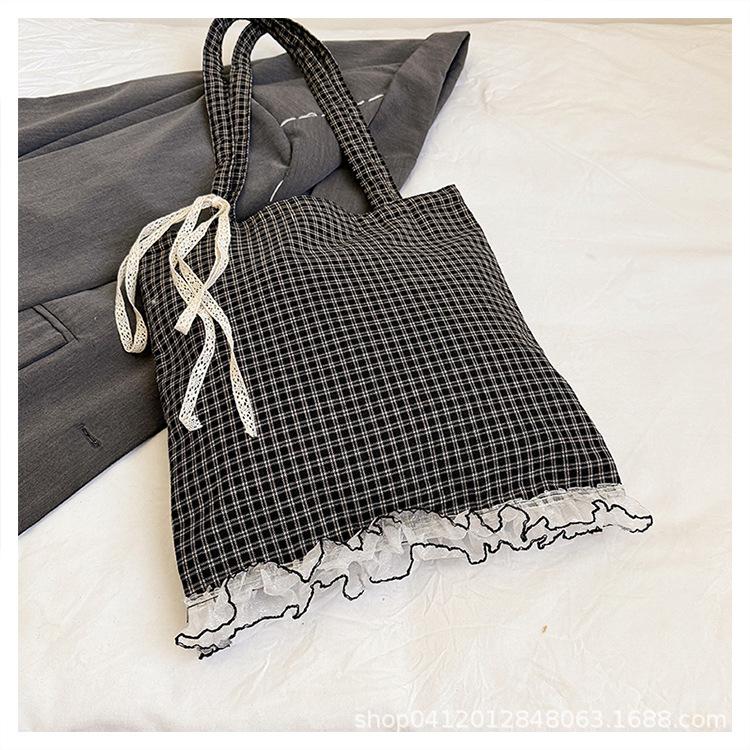 

Niche fashion simple Korean version of literary and white floral cotton bag versatile shoulder handbag female hand-held small cloth bag чёрный