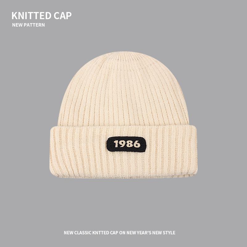 Knitted wool hat children's autumn and winter trendy brand bag head warm cold hat sticker letter big head circumference stacking hat