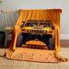 Front view of a bright yellow rugged vehicle against an orange background. for all seasons blanket lunch break throw gift