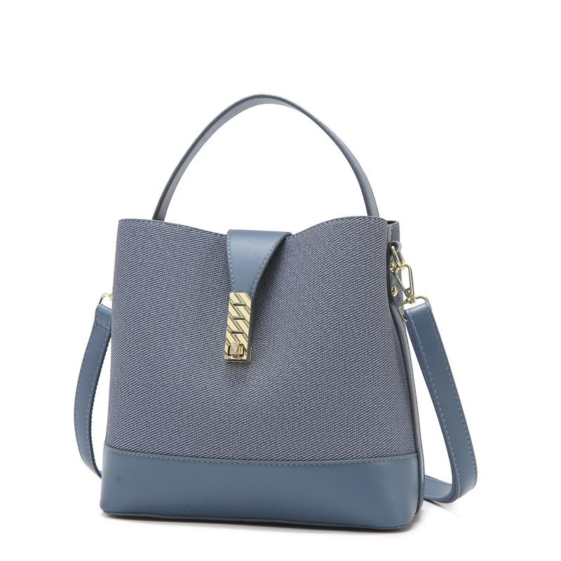 Large-capacity versatile bucket bag, commuter bag, simple and high-end women's bag, new shoulder portable messenger women's bag.