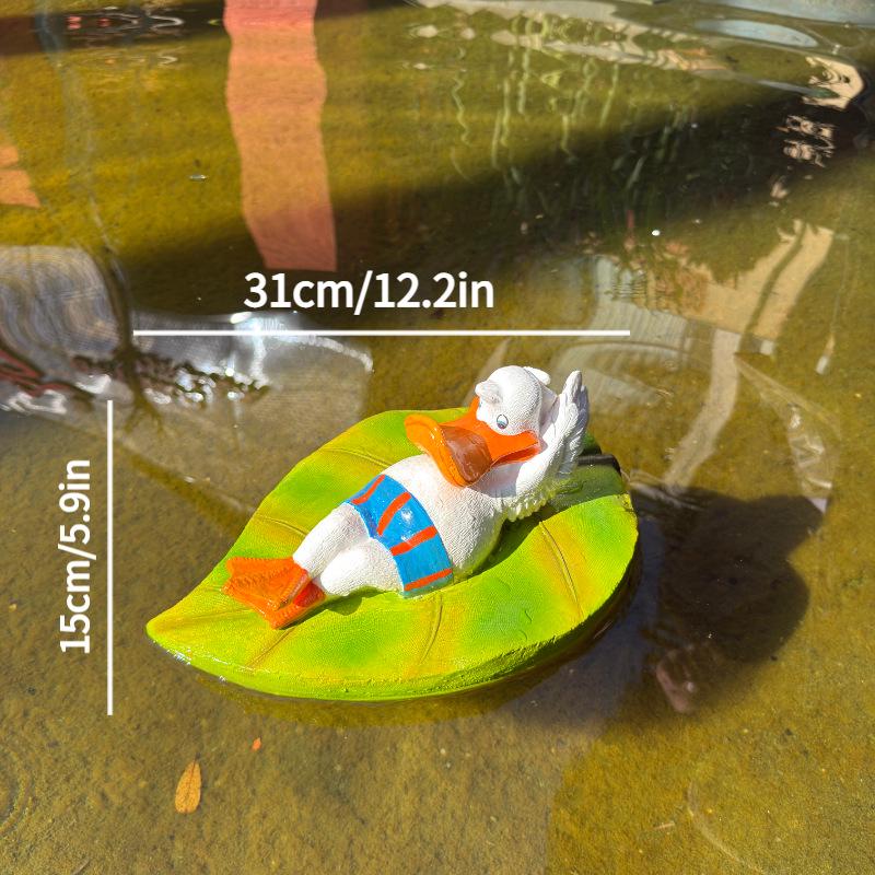 

Floating Cartoon Duck on Leaves Water Decor Statue for Pools & Fish Tanks