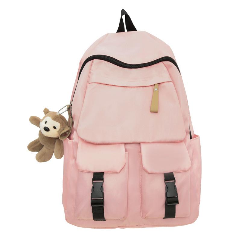 

Backpack men s simple large-capacity travel backpack women s casual Japanese junior high school student high school student schoolbag men single package рожевий