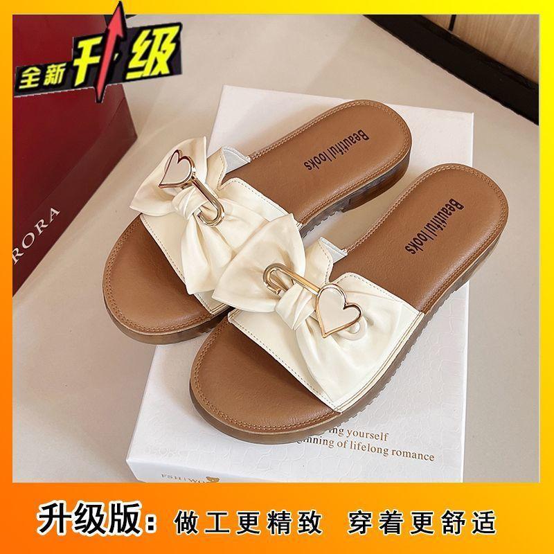 Non-slip outer wear fashion popular versatile slippers women 2025 summer new casual flat bow one-word drag women