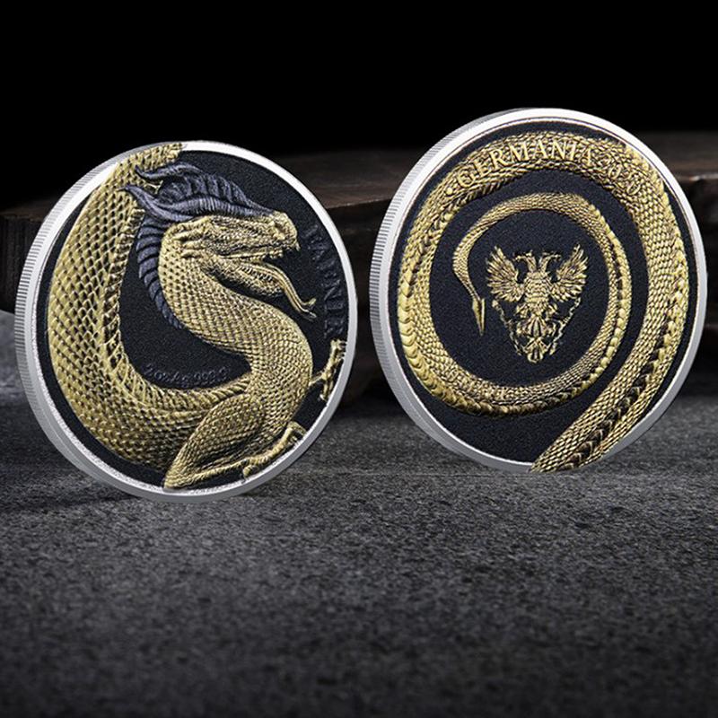 

Посеребренные памятные монеты «Дракон»