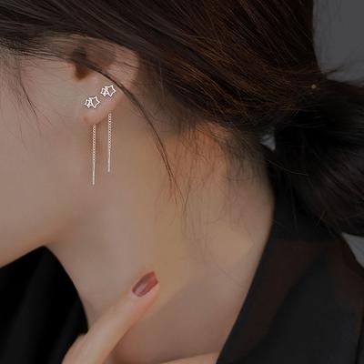 Pendientes de estrella hueca con cadena y flecos de metal, con temperamento simple y estrella de cinco puntas.
