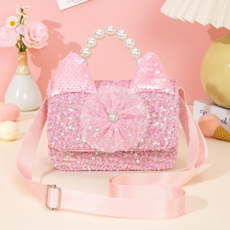 

Cute girls cat bag: pearl handle,patch details! Adorable crossbody/handheld design—shiny, and perfect for little fashionistas.