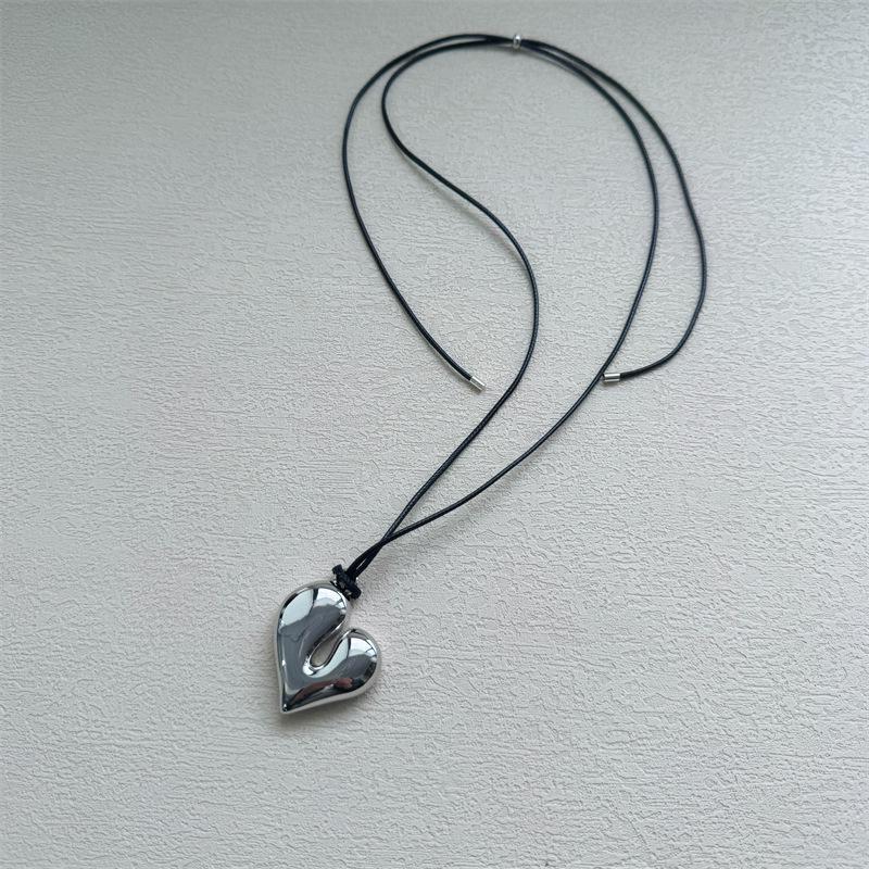 

Blogger Reina High-End Black Rope Halter Ожерелье - Регулируемая цепочка для свитера для женщин серебряный