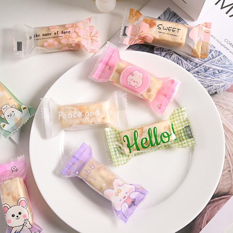 100Pcs 4x9cm Cute Cartoon Animal Printed Plastic Baking Packaging Nougat Toffee Candy Food Machine Sealed Gift Bags