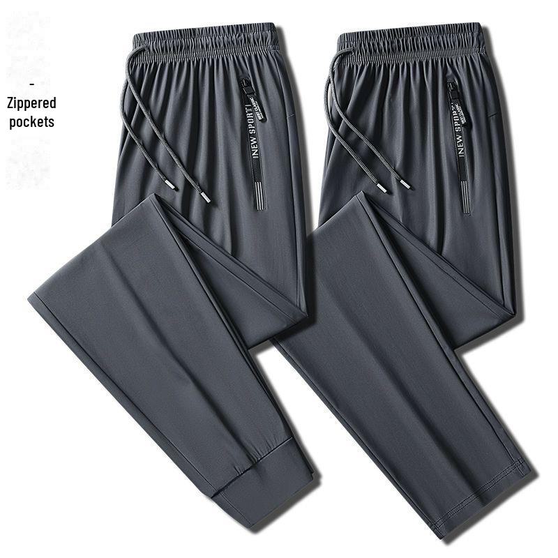 Pantaloni della tuta casual estivi da uomo in seta ghiacciata, sottili e traspiranti, con gamba dritta, tasche con cerniera e polsini.