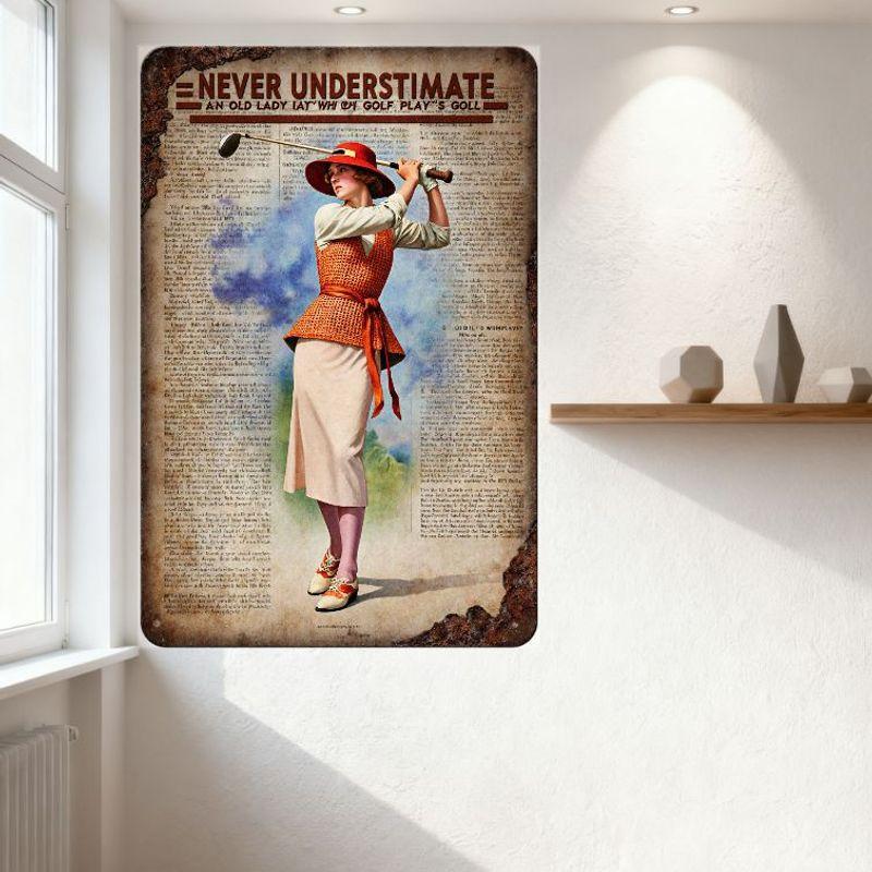 Vintage 1920s Lady Playing Golf Metal Tin Sign 'NEVER UNDERSTIMATE AN OLD LADY WHO CAN GOLF' Wall Decor for Home Man Cave Bar Cl