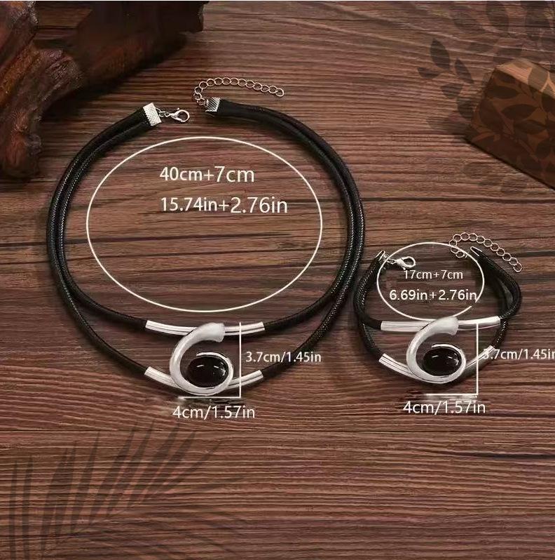1 set of retro sexy jewelry set, black faux thread and metal tube, geometric spiral pendant.