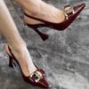 2025 summer new high heels metal decoration word empty soft sole temperament pointed sexy bag head sandals women
