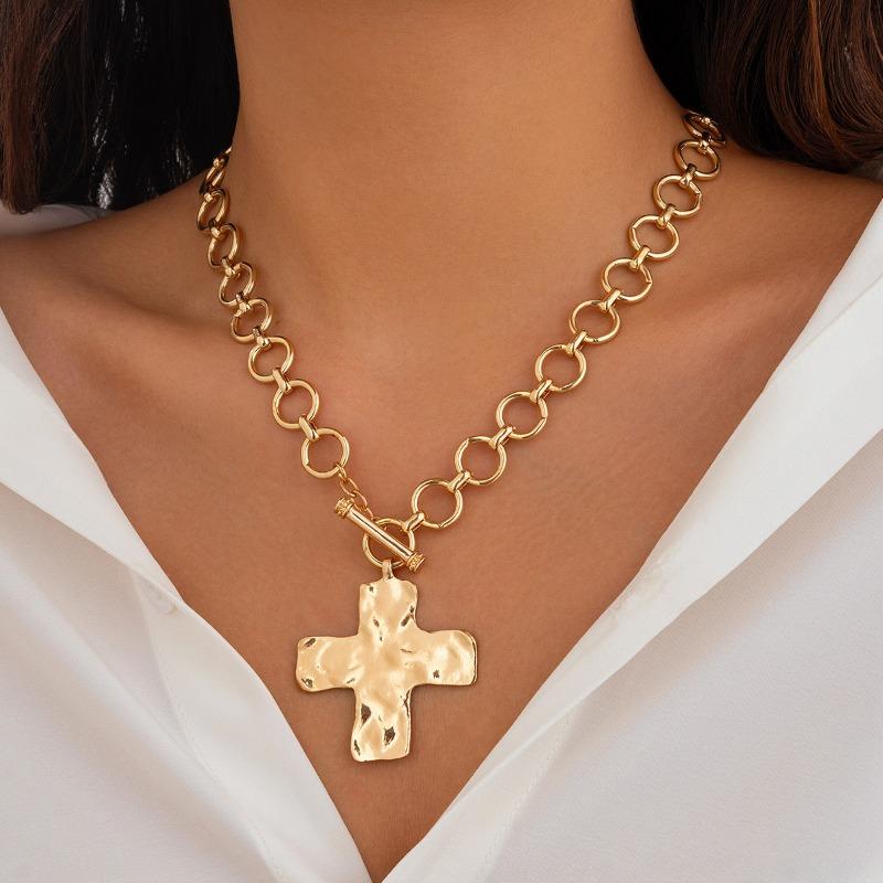 Meier Punk-inspired metal cross necklace with a trendy, edgy design. features a sweet and cool ot clasp chain
