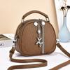 Simple and fashionable single shoulder portable messenger bag autumn and winter exquisite small round bag women's multi-layer fringed bag