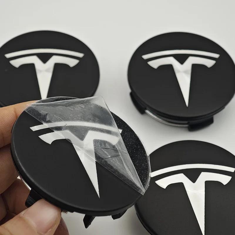 Samolepka na auto 2025 Nové Tesla 4ks ABS 56mm Kryty odznaků Tesla Model 3 Model Y Krytky nábojů Středové krytky kol pro Tesla Model Y X S 202