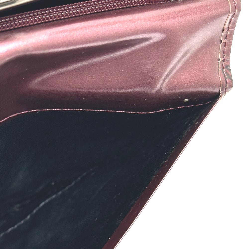 Yves Saint Laurent Carteira Longa Bifold com Fecho de Beijo com Padrão YSL por todo