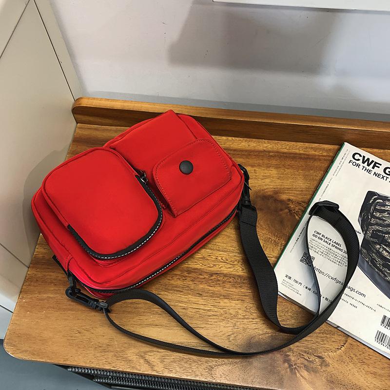 

Casual messenger bag men s fashion niche Korean version small square bag simple personalized backpack Japanese casual shoulder bag tide червоний