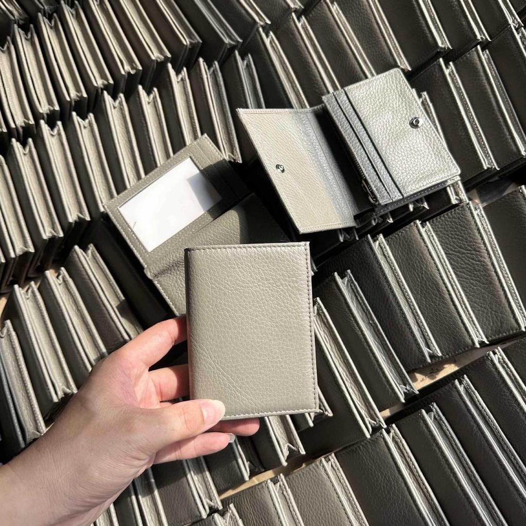 Premium Leather Card Holder: Unisex Cowhide Business Case with Mirror Window, Snap Closure & Coin Purse.