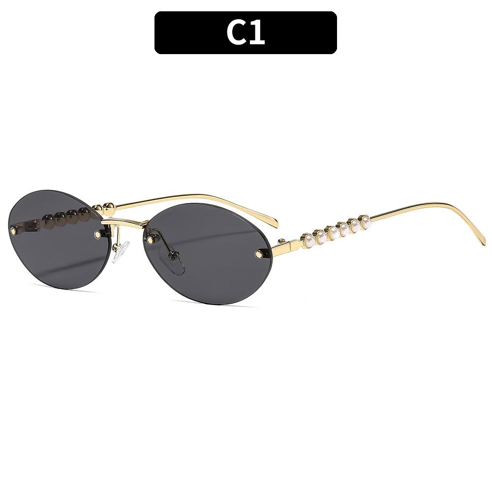 Ladies sunglasses, rimless oval sunglasses, pearl embellished sunglasses.