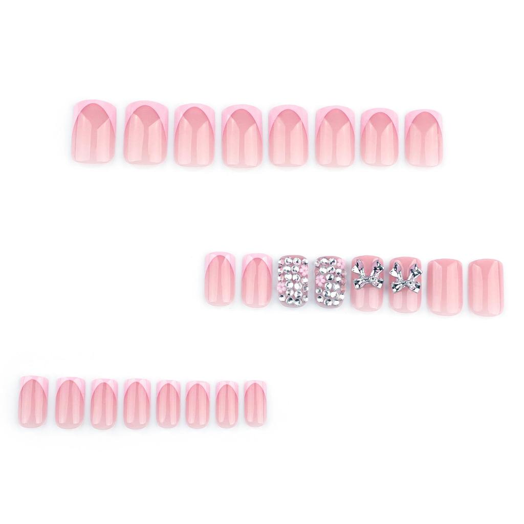 Short Square French Pink False Nails with 3D Metal Bow and Glitter Sparkle Nail Art.