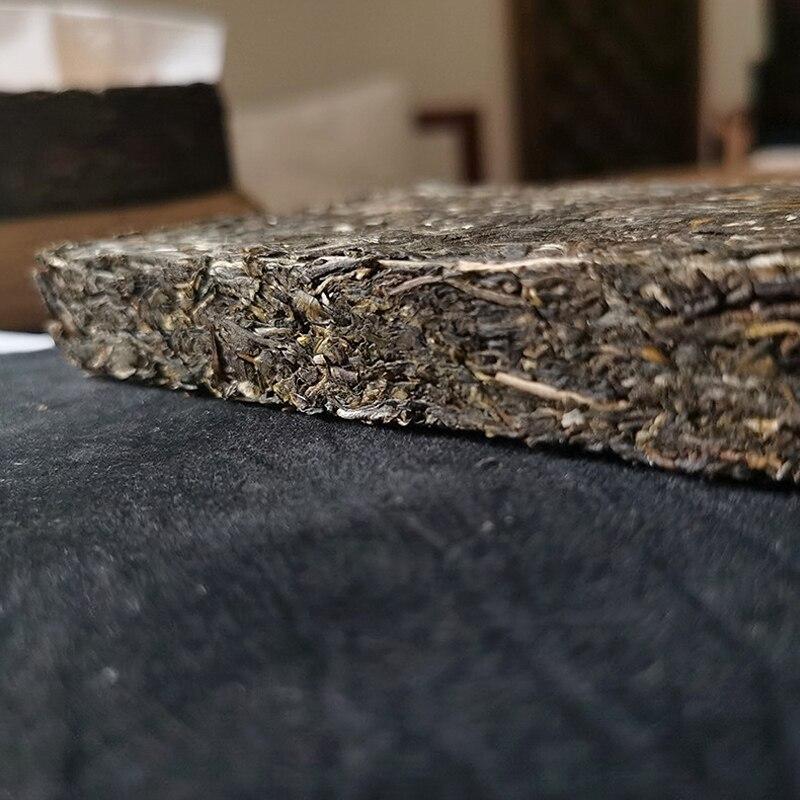 Tè Puerh Crudo 2012 Albero Antico Yiwu Sheng Puerh Tè Compresso 250g