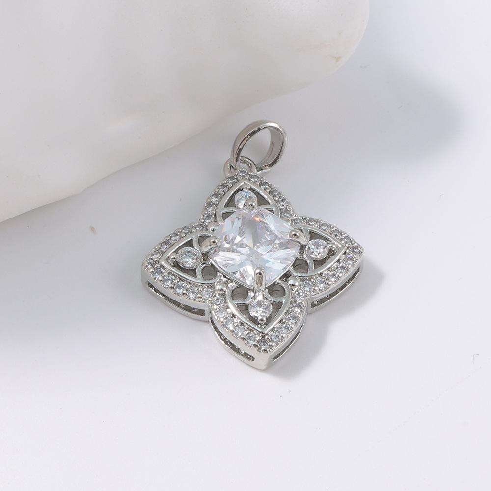Luxury Four-Leaf Clover Pendant with Main Diamond & Zirconia Accents