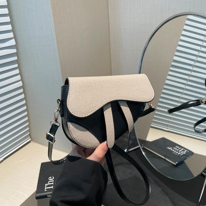 Fashion Trend Design Sense Niche Women's Bag Shoulder Messenger Bag Special-shaped Contrasting Color Splicing Saddle Bag