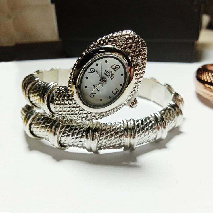 

Жіночий браслет «Змія» з діамантами. Кварцовий годинник